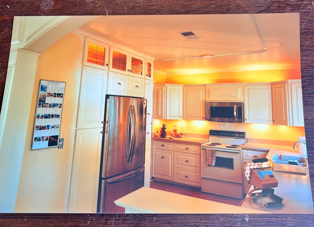 Modern kitchen with stainless steel appliances.