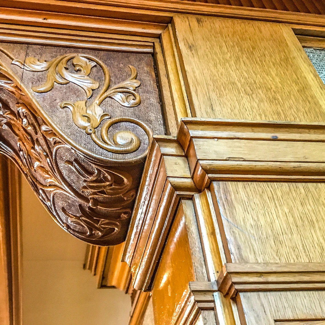 Ornate wooden door frame with carvings
