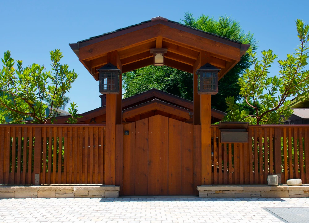 Traditional wooden entrance with greenery